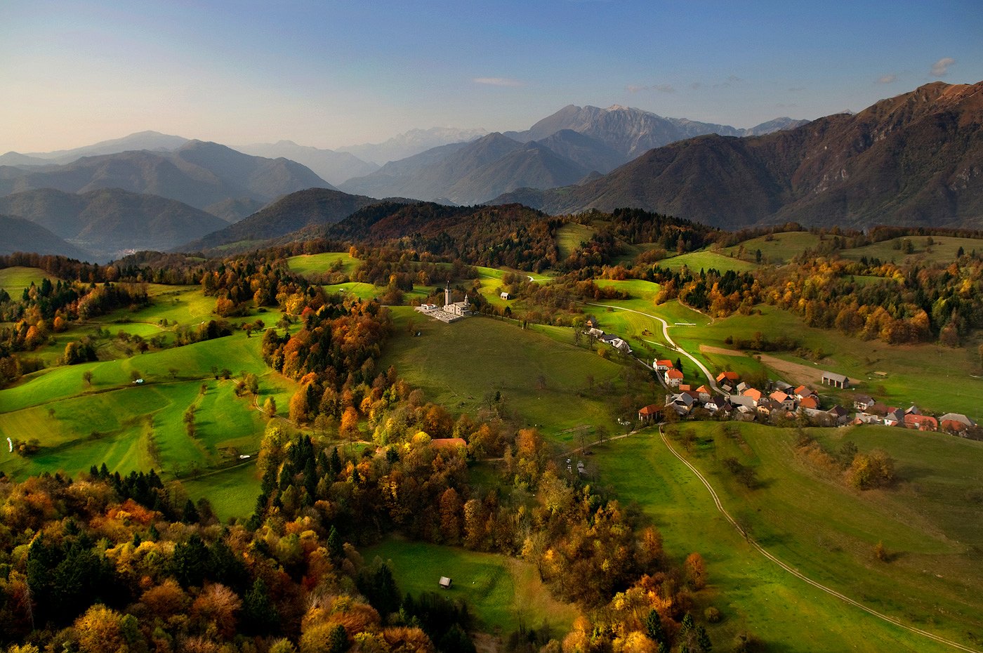 Šentviška plateau with the Church of the Visitation of Mary from a bird's eye view